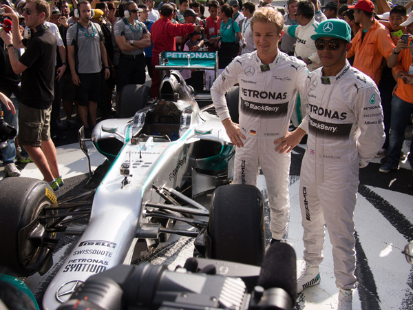 Nico Rosberg and Lewis Hamilton, after demo run with F1 race car