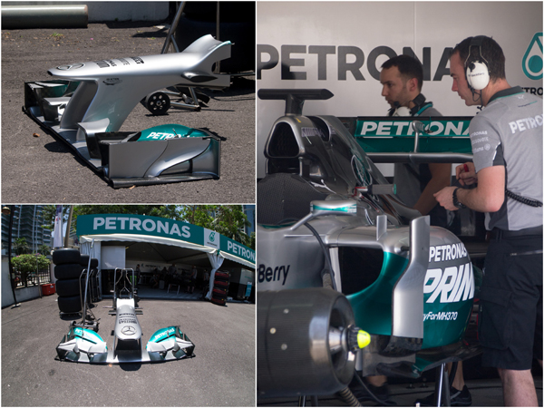 the 2013 Mercedes AMG PETRONAS F1 race car being prep